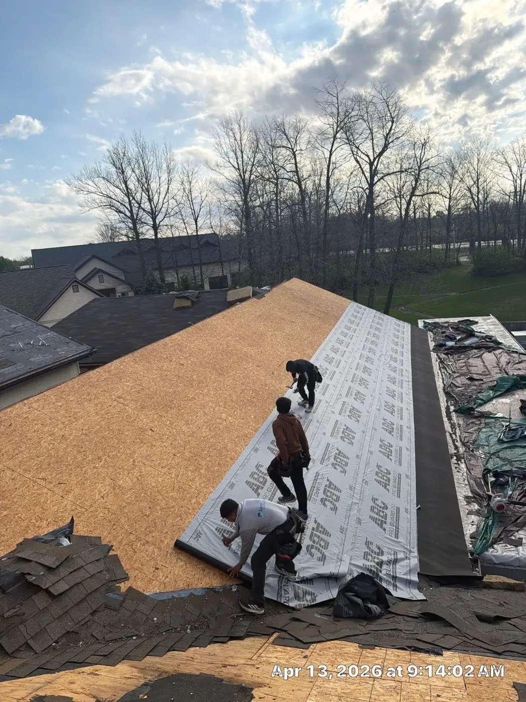 Tarping and dry-in on a New Castle commercial roof